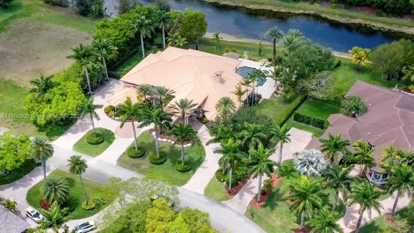 a view of a lake with a yard