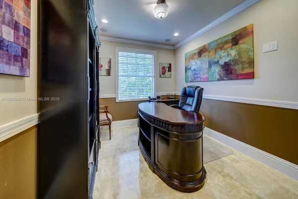 a dining room with furniture a window and a rug