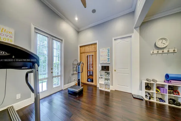 a view of a livingroom with furniture and hardwood floor