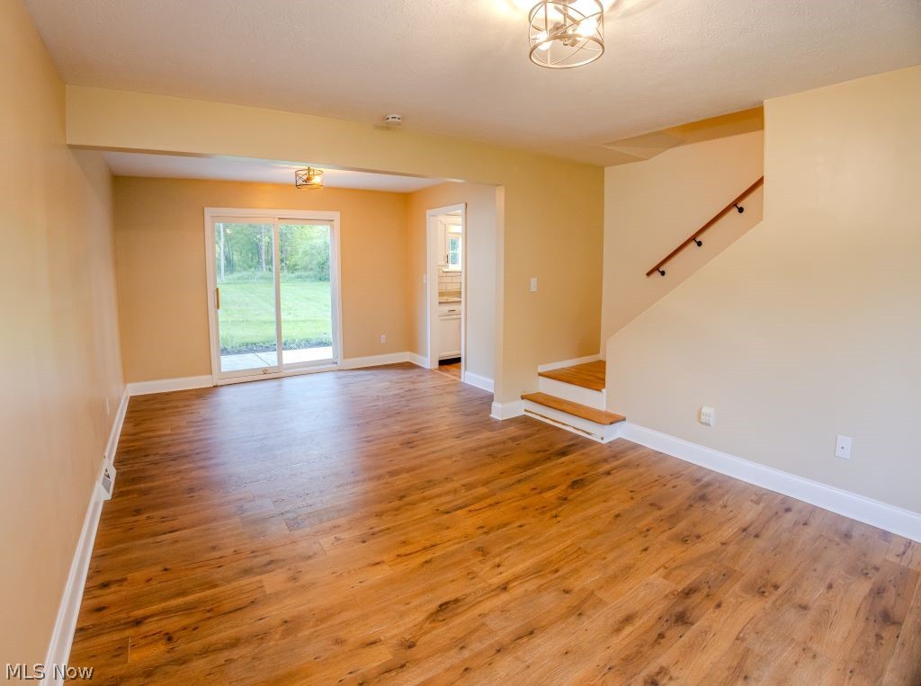 8828 Edgehill Road Mentor, OH 44060 - Photo 13 of 24 Spare room featuring hardwood / wood-style flooring
