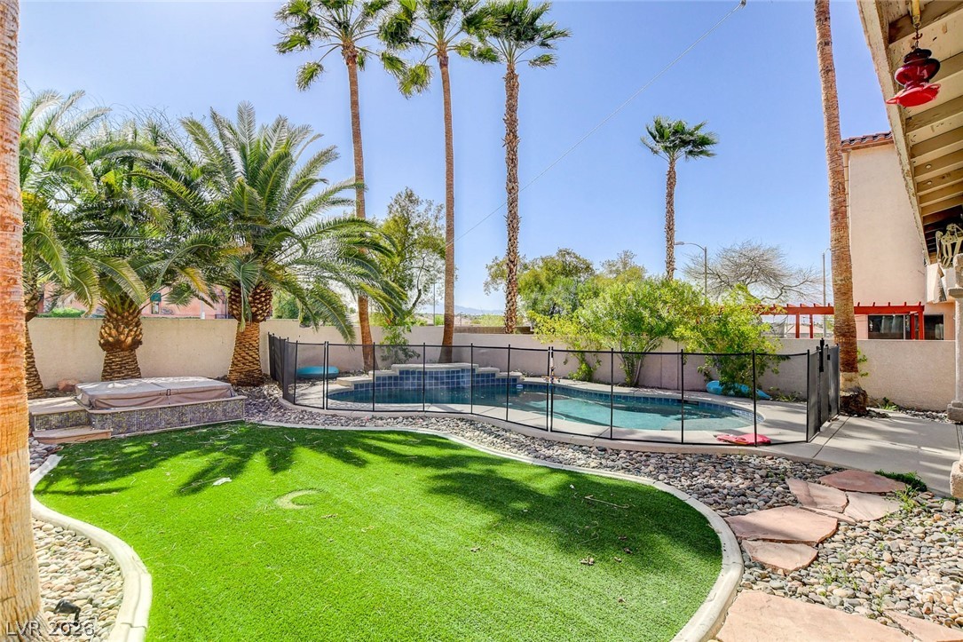 191 Verde Ridge Court Henderson, NV 89012 - Photo 34 of 36 View of swimming pool with a patio