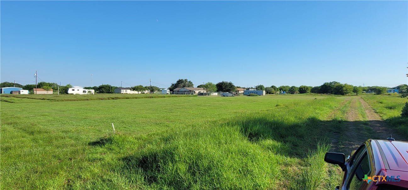 0 Frisco Seadrift, TX 77983 - Photo 2 of 3 a view of a golf course with a lake