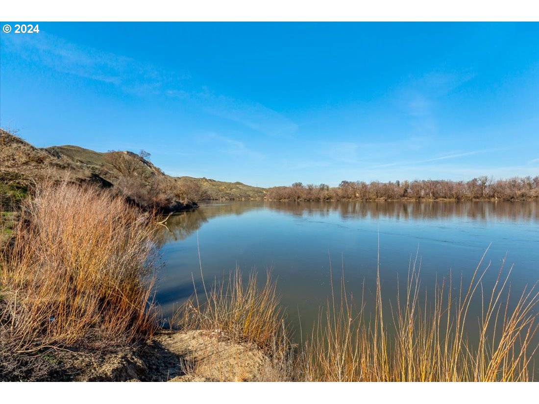 5645 Highway 201 Ontario, OR 97914 - Photo 4 of 32 a view of lake with mountain in the background