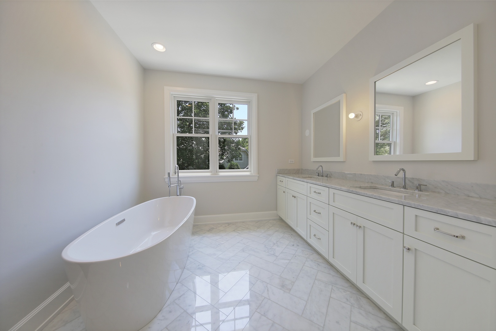 408 The Lane Hinsdale, IL 60521 - Photo 18 of 33 a spacious bathroom with double vanity sink a mirror and a toilet