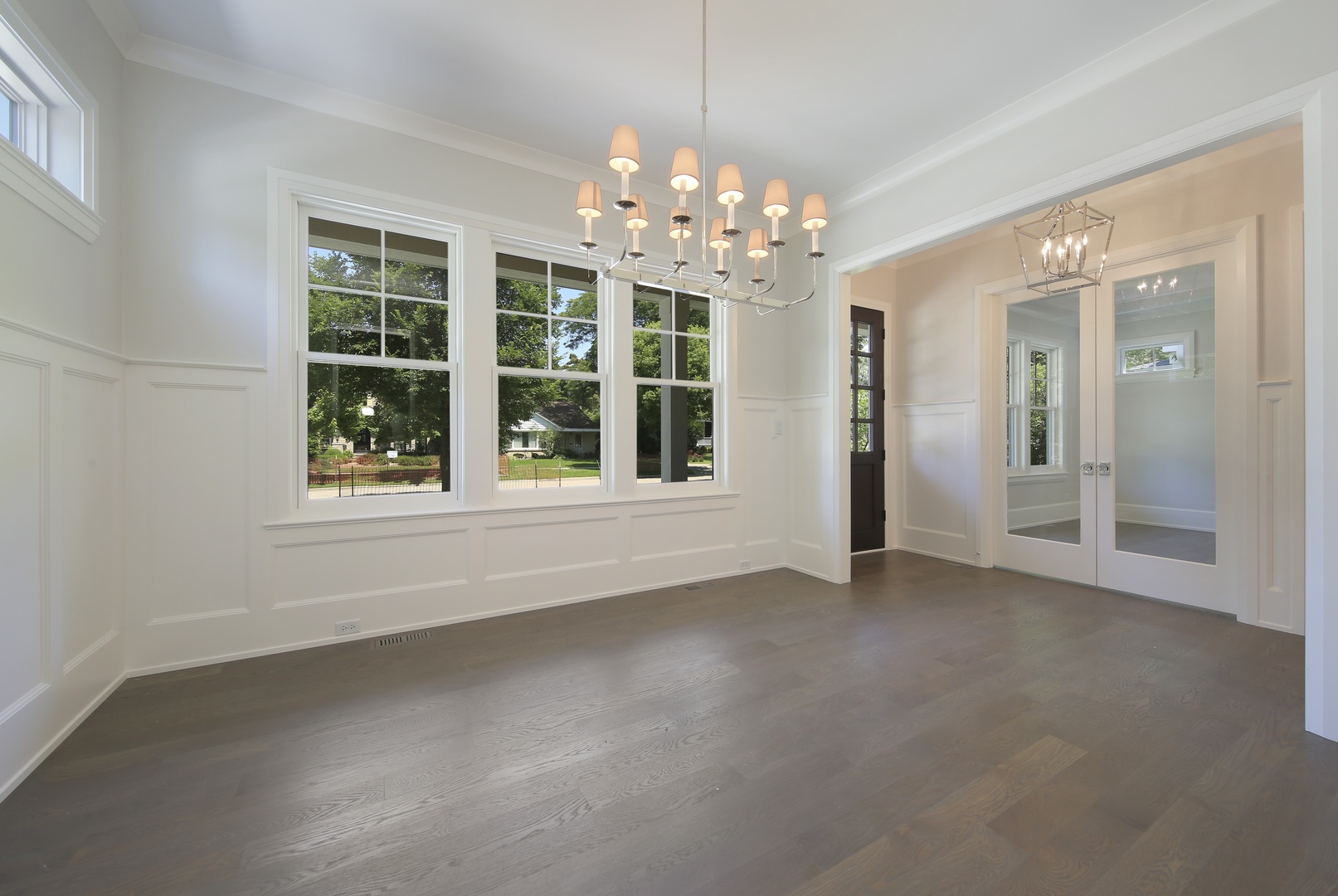 408 The Lane Hinsdale, IL 60521 - Photo 3 of 33 wooden floor in an empty room with a window