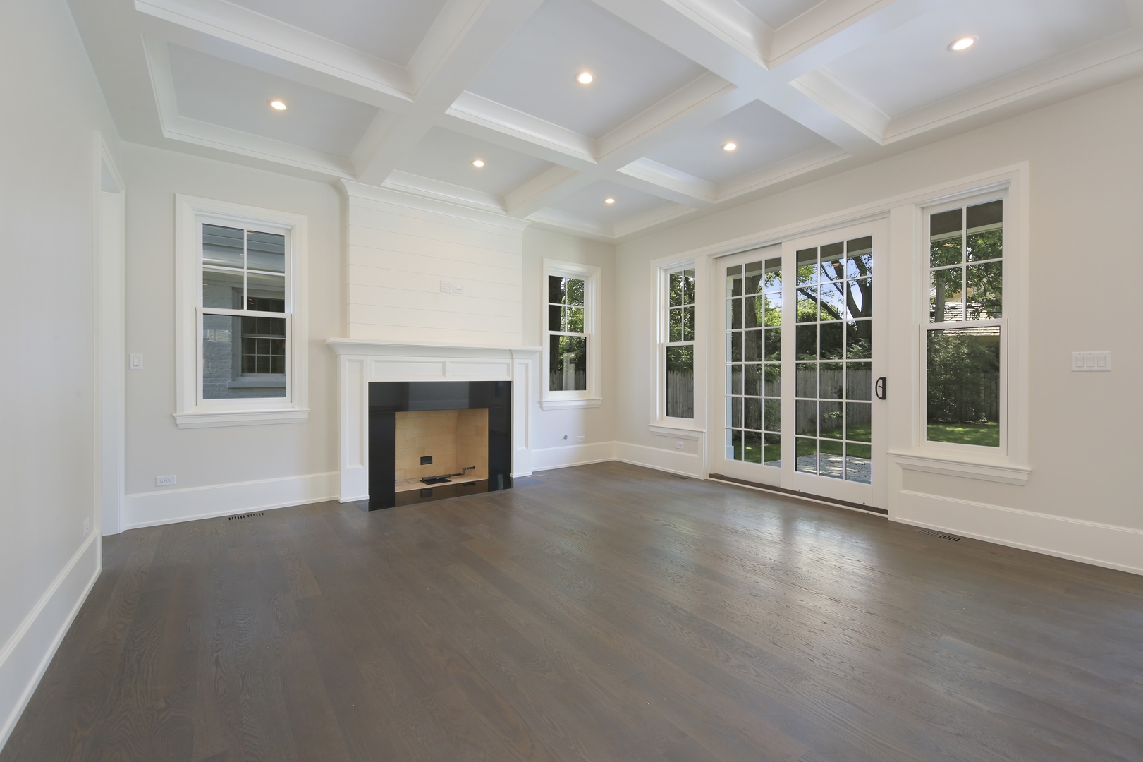 408 The Lane Hinsdale, IL 60521 - Photo 8 of 33 a view of an empty room with a fireplace and a window