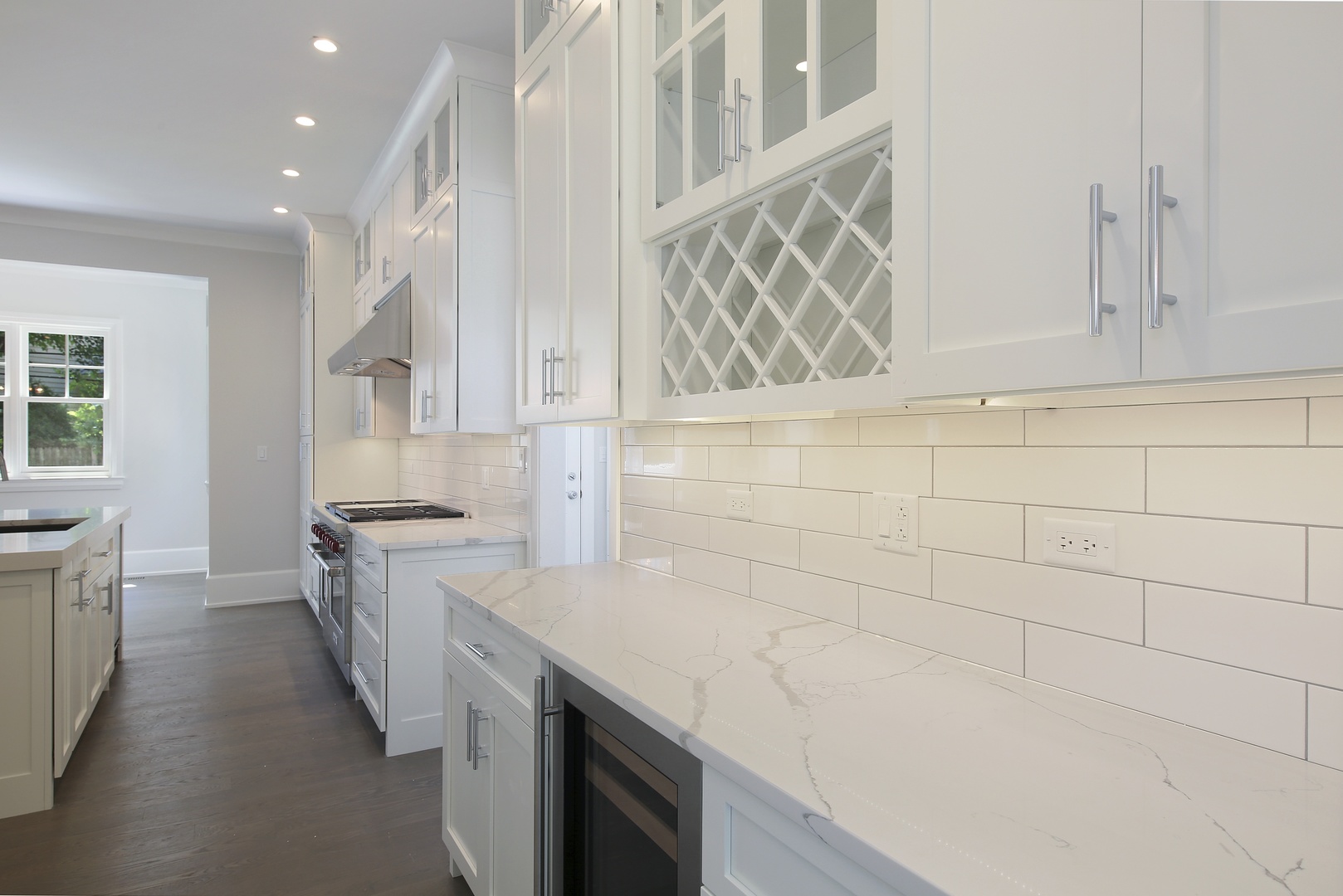408 The Lane Hinsdale, IL 60521 - Photo 9 of 33 a kitchen with granite countertop a sink a stove and dishwasher