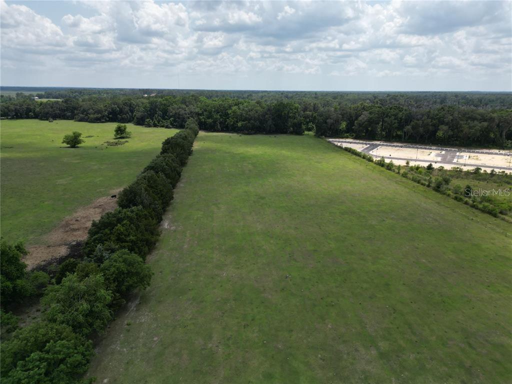24 Southwest 62nd Avenue Gainesville, FL 32607 - Photo 3 of 3 a view of a golf course with a lake