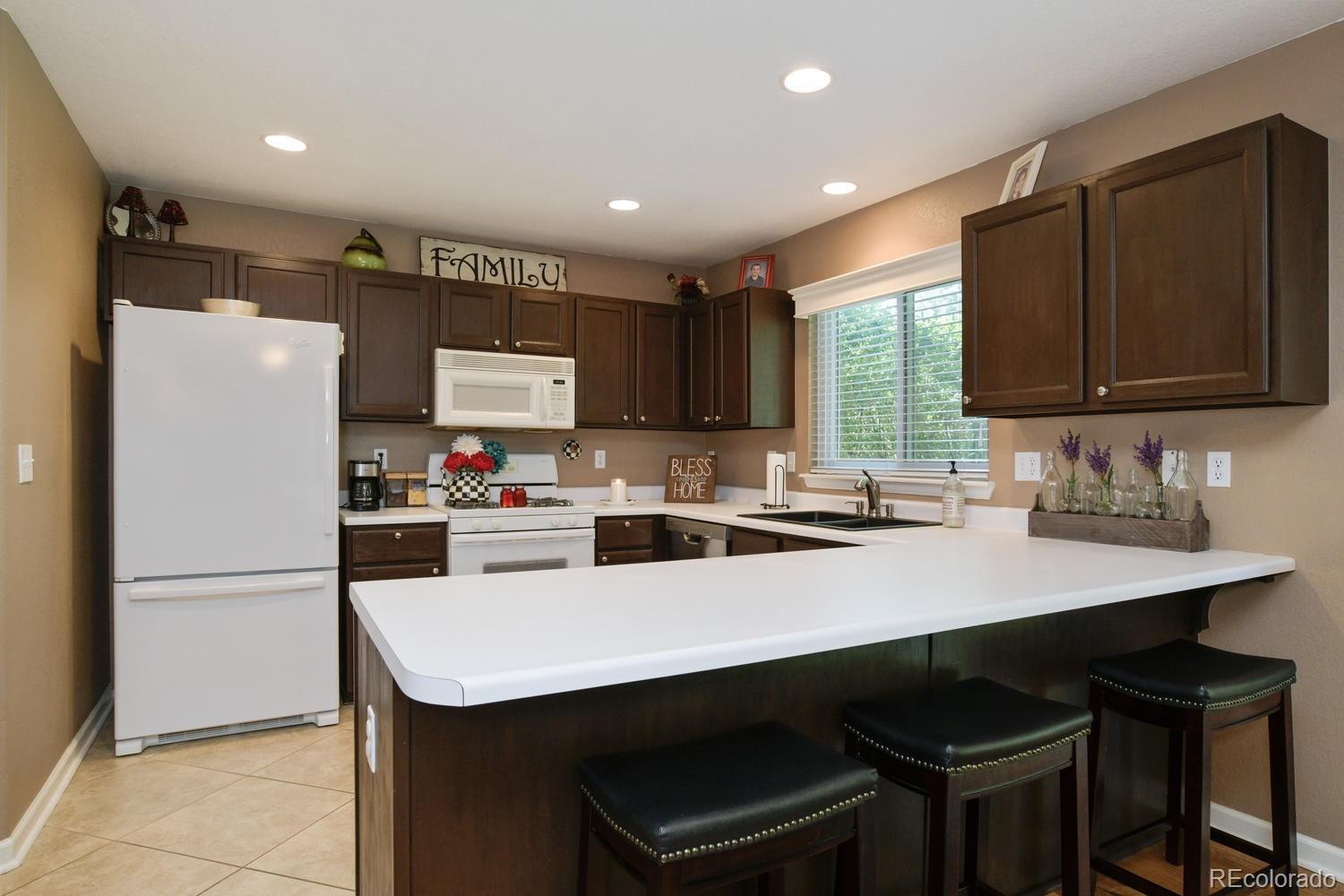 9875 Saybrook Street Highlands Ranch, CO 80126 - Photo 7 of 27 Gallery Image 7