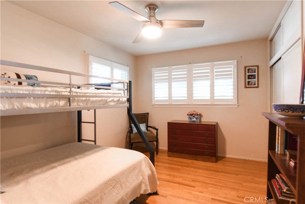 5382 Brighton Drive Riverside, CA 92504 - Photo 18 of 31 Bedroom 1 with ceiling fan and shutters