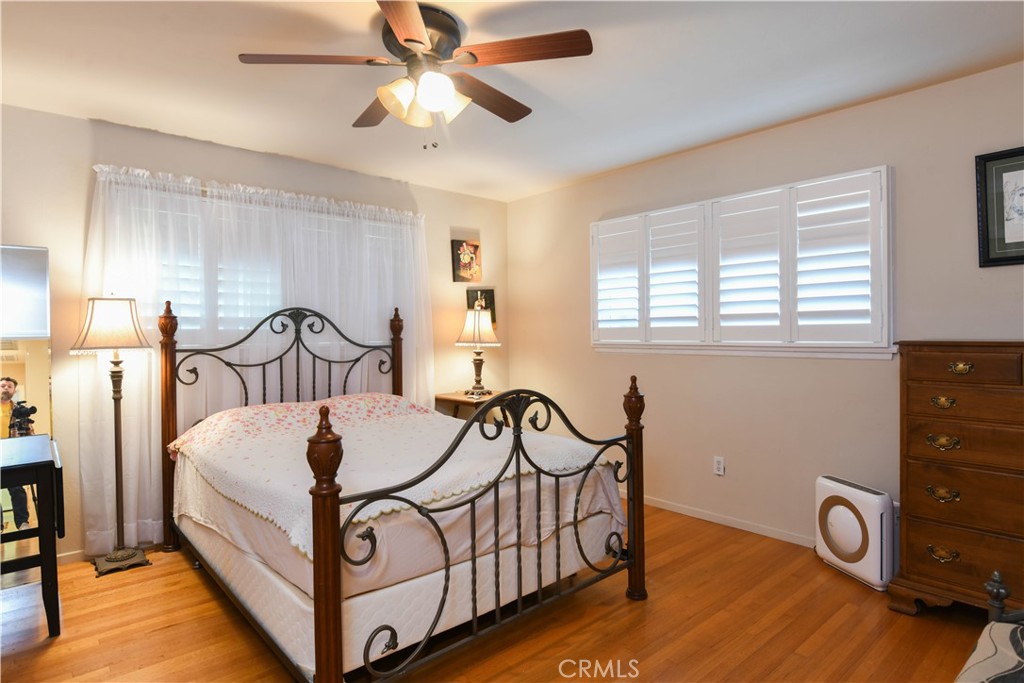 5382 Brighton Drive Riverside, CA 92504 - Photo 20 of 31 Bedroom 2 with ceiling fan and shutters