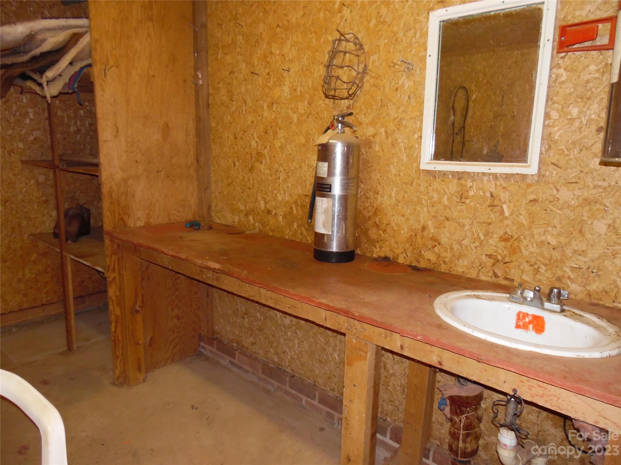 7728 Monbo Road Catawba, NC 28609 - Photo 11 of 39 a bathroom with a sink and a mirror