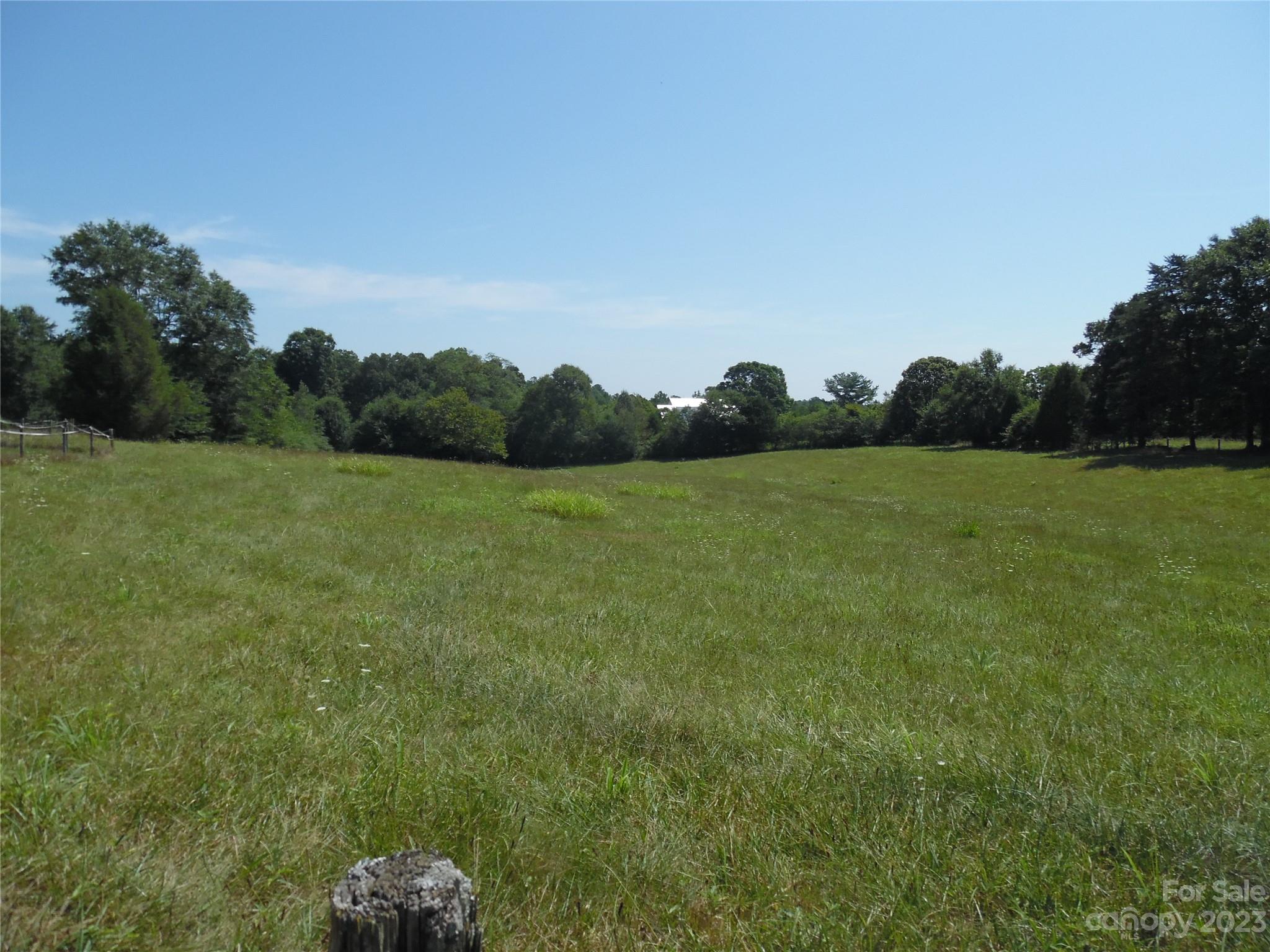 7728 Monbo Road Catawba, NC 28609 - Photo 14 of 39 a view of a field with trees in the background