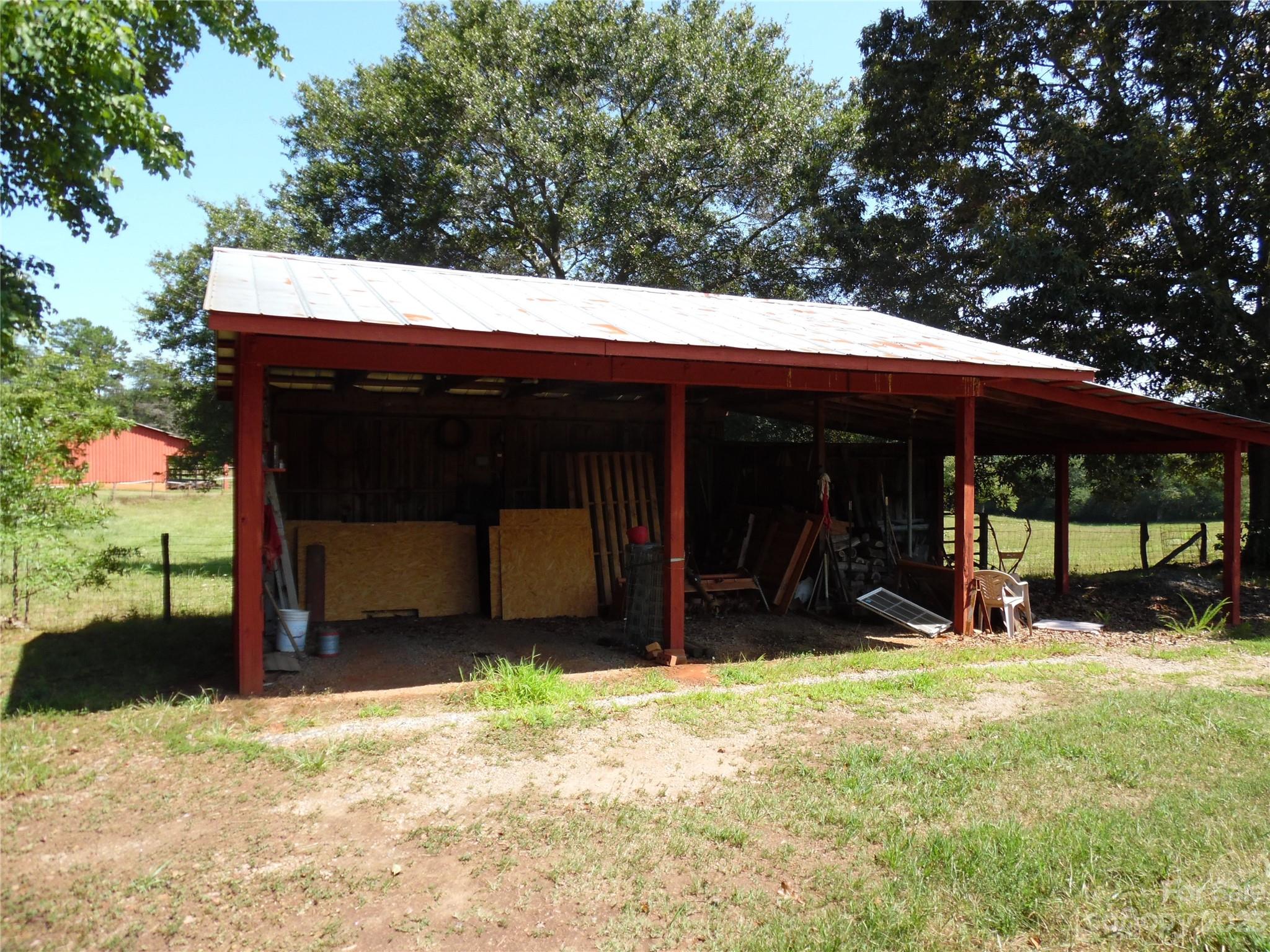 7728 Monbo Road Catawba, NC 28609 - Photo 15 of 39 a view of a house with a yard and garage