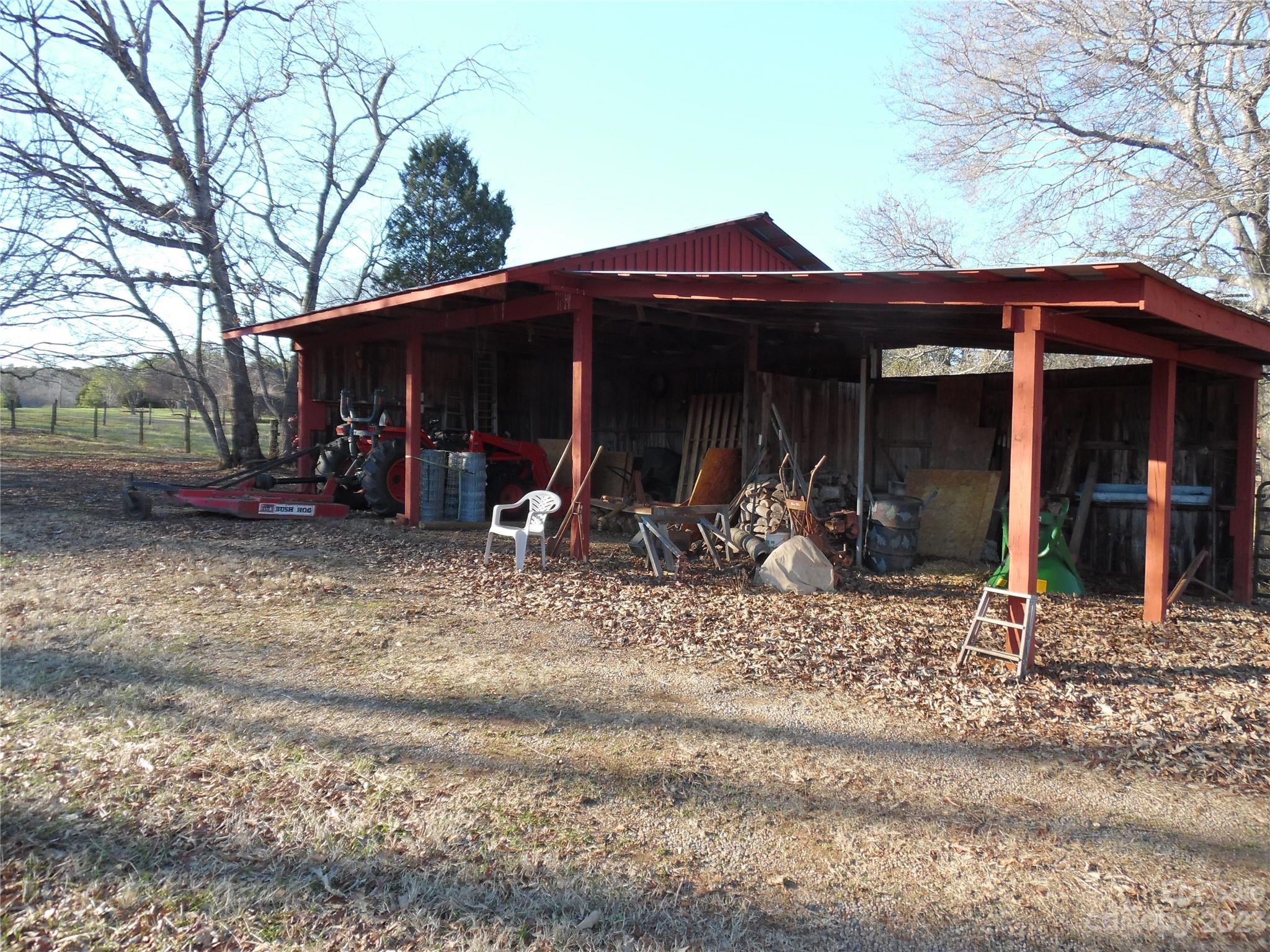 7728 Monbo Road Catawba, NC 28609 - Photo 16 of 39 a front view of a house with garden