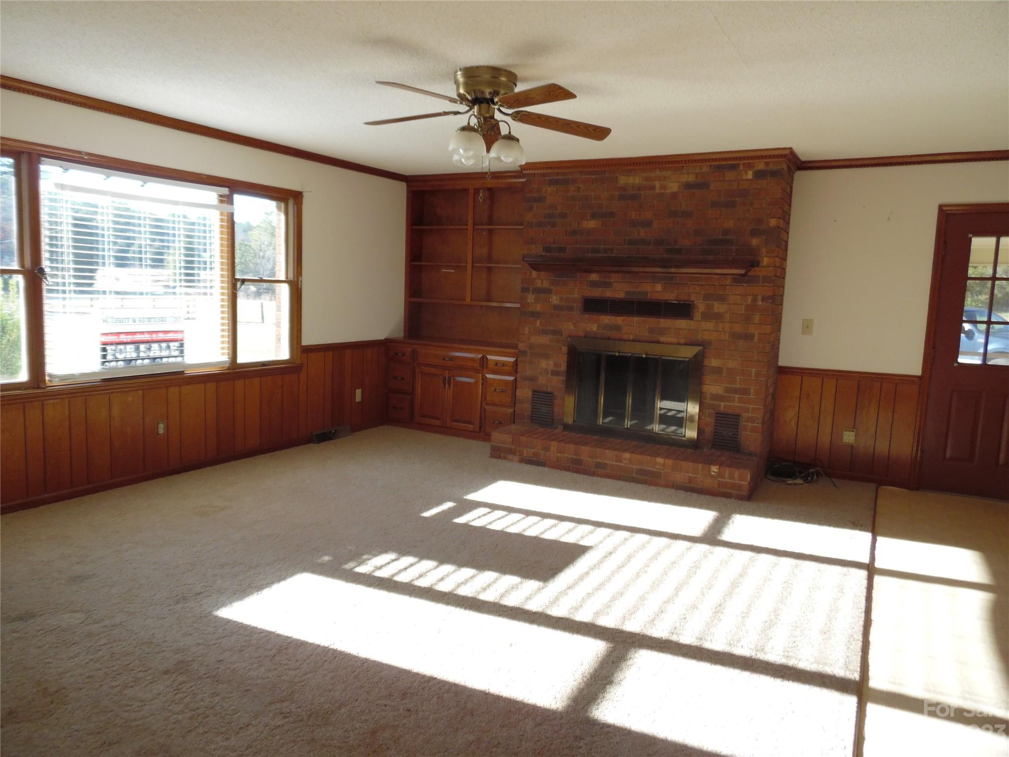 7728 Monbo Road Catawba, NC 28609 - Photo 20 of 39 a living room with furniture and a fireplace