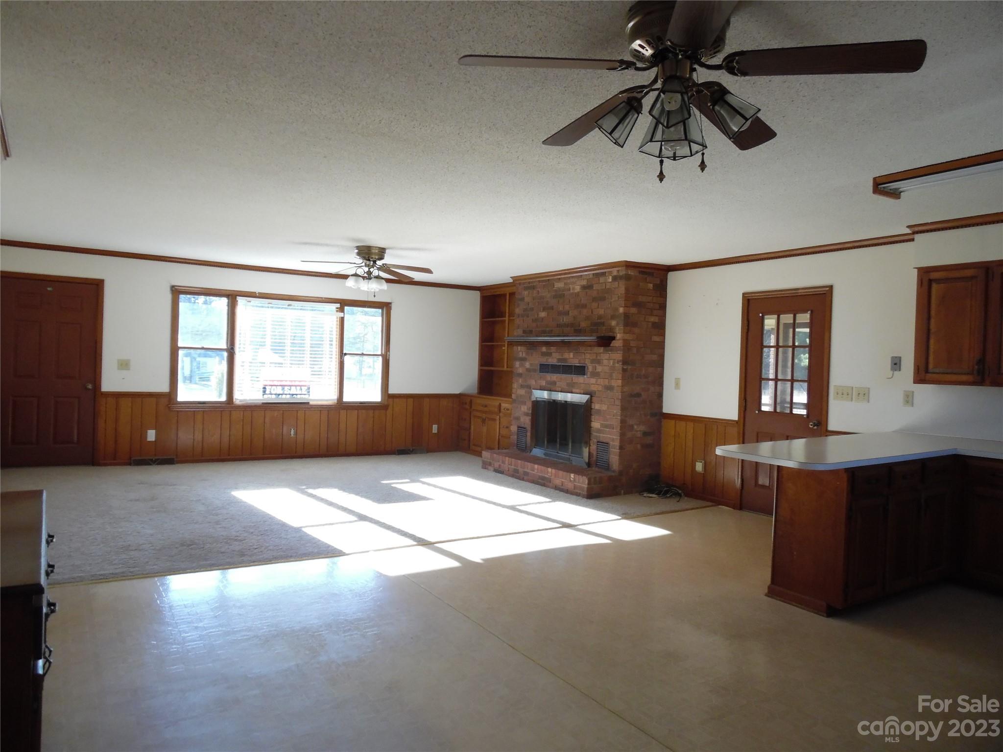 7728 Monbo Road Catawba, NC 28609 - Photo 22 of 39 a living room with furniture and a fireplace