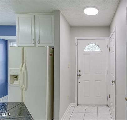 8184 McGuire Drive Raleigh, NC 27616 - Photo 2 of 13 a view of a hallway with wooden cabinets
