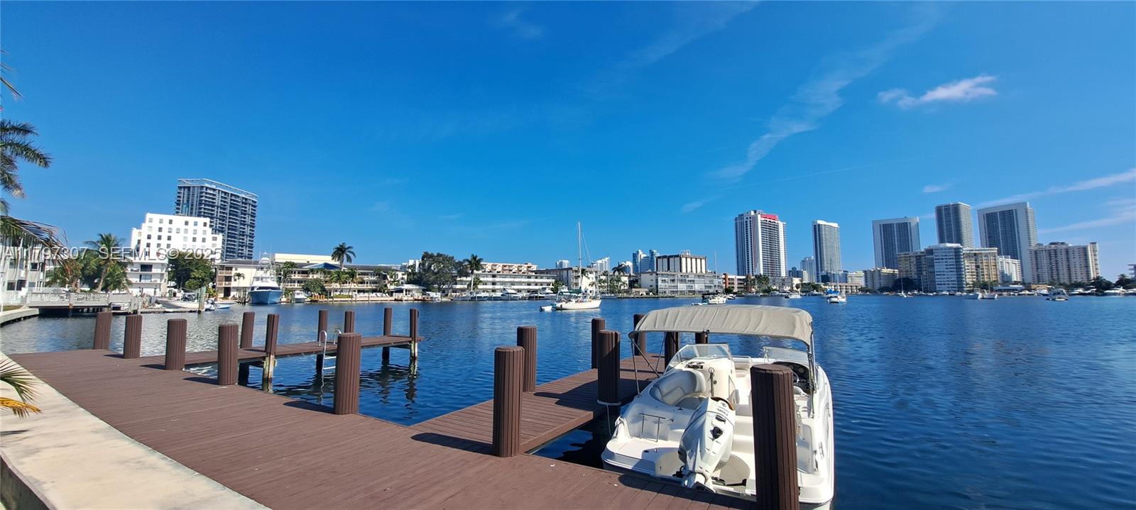 450 Golden Isles Drive, Unit 2H Hallandale Beach, FL 33009 - Photo 2 of 24 a view of a city