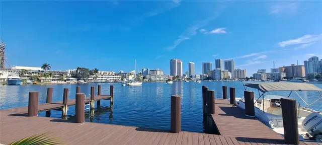 a view of a patio with table and chairs