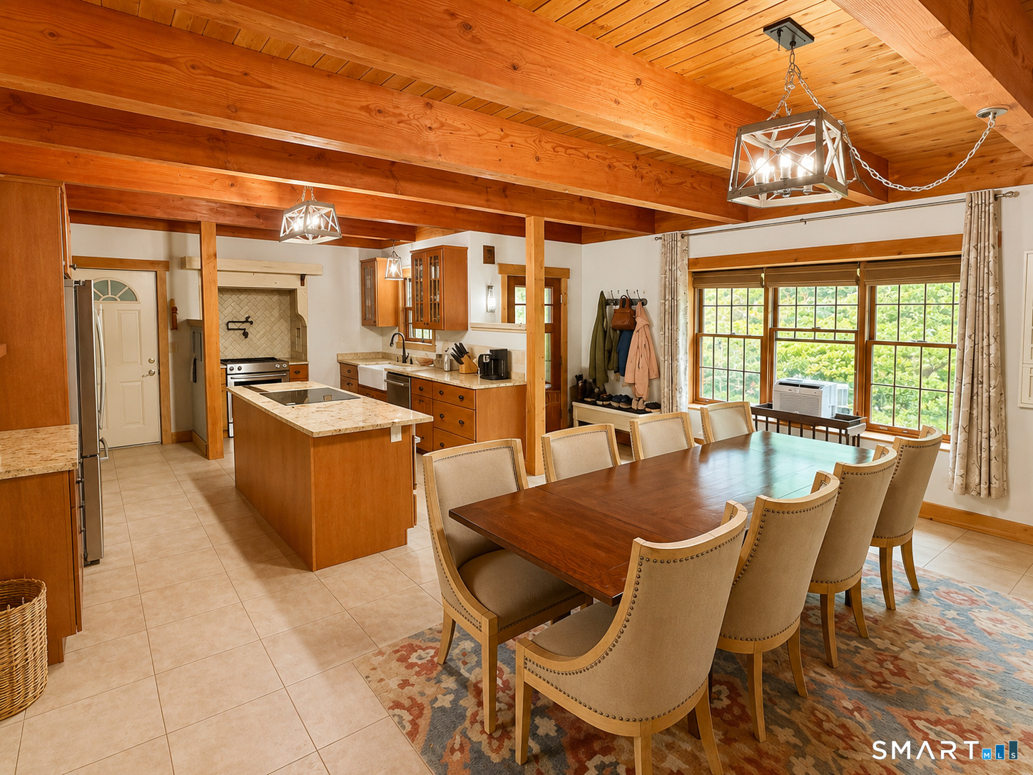 44 Pine Road Colebrook, CT 06021 - Photo 6 of 40 a dining room with furniture a chandelier and wooden floor