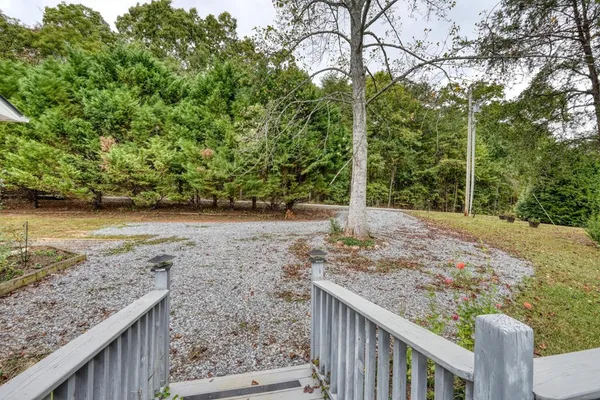 a view of a yard with an outdoor space
