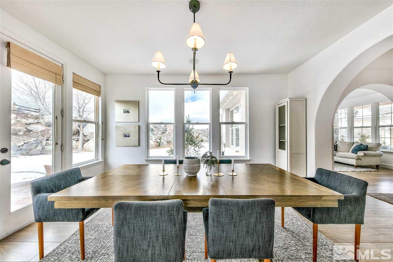 2931 Flint Ridge Court Reno, NV 89511 - Photo 11 of 37 a view of a dining room with furniture window and outside view