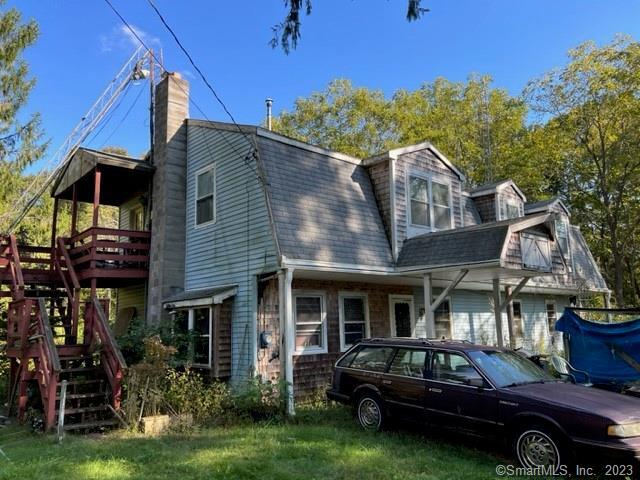 a car parked in front of a house