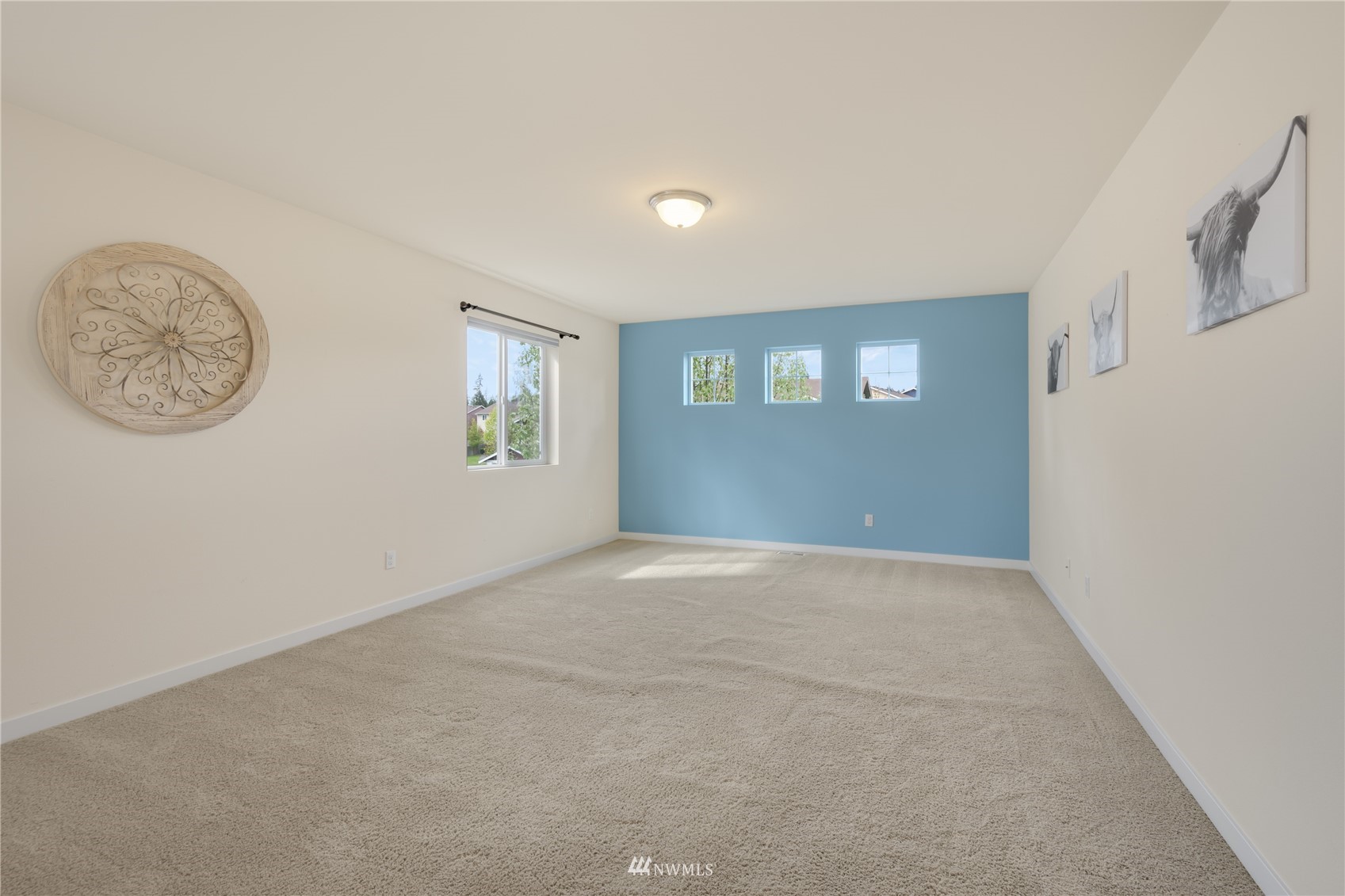 3712 224th Street Southeast Bothell, WA 98021 - Photo 12 of 24 an empty room with windows and closet