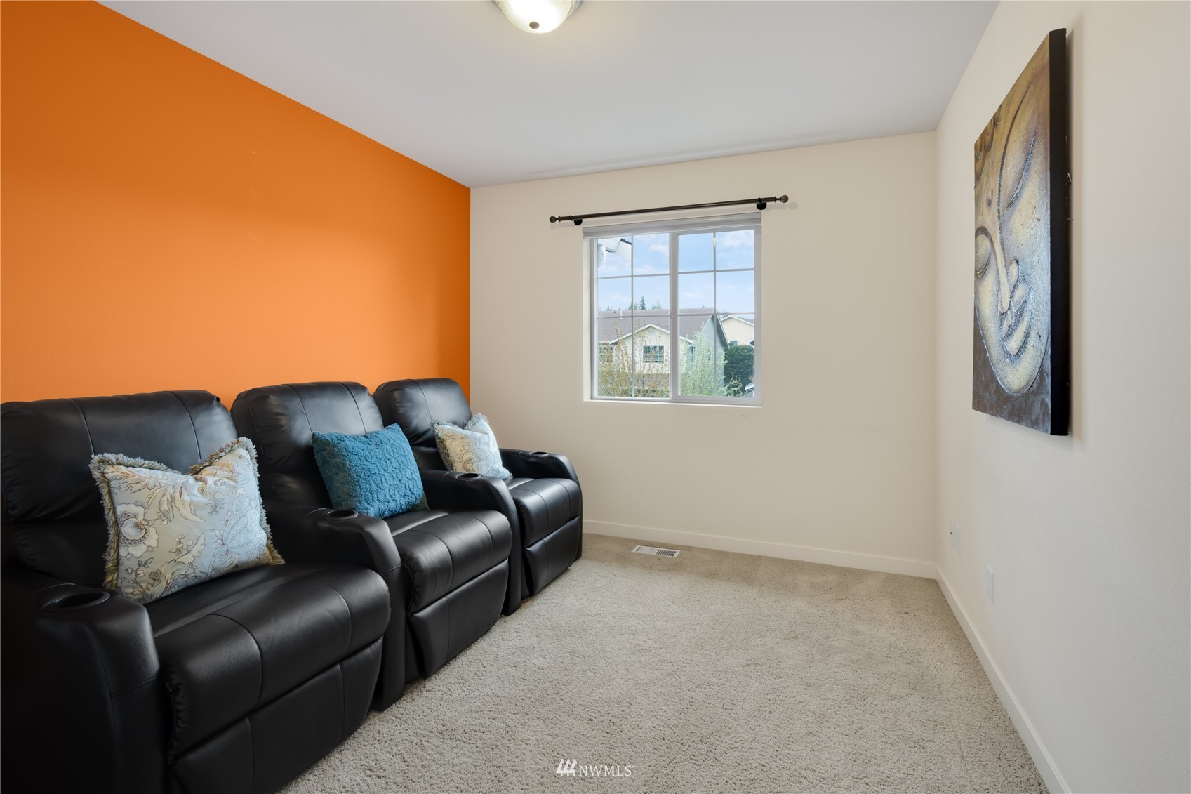 3712 224th Street Southeast Bothell, WA 98021 - Photo 14 of 24 a living room with furniture and a window