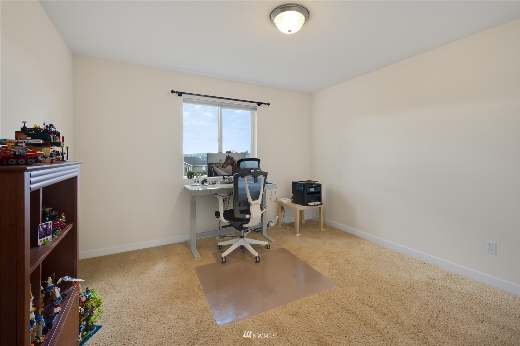 3712 224th Street Southeast Bothell, WA 98021 - Photo 16 of 24 a view of a workspace with furniture