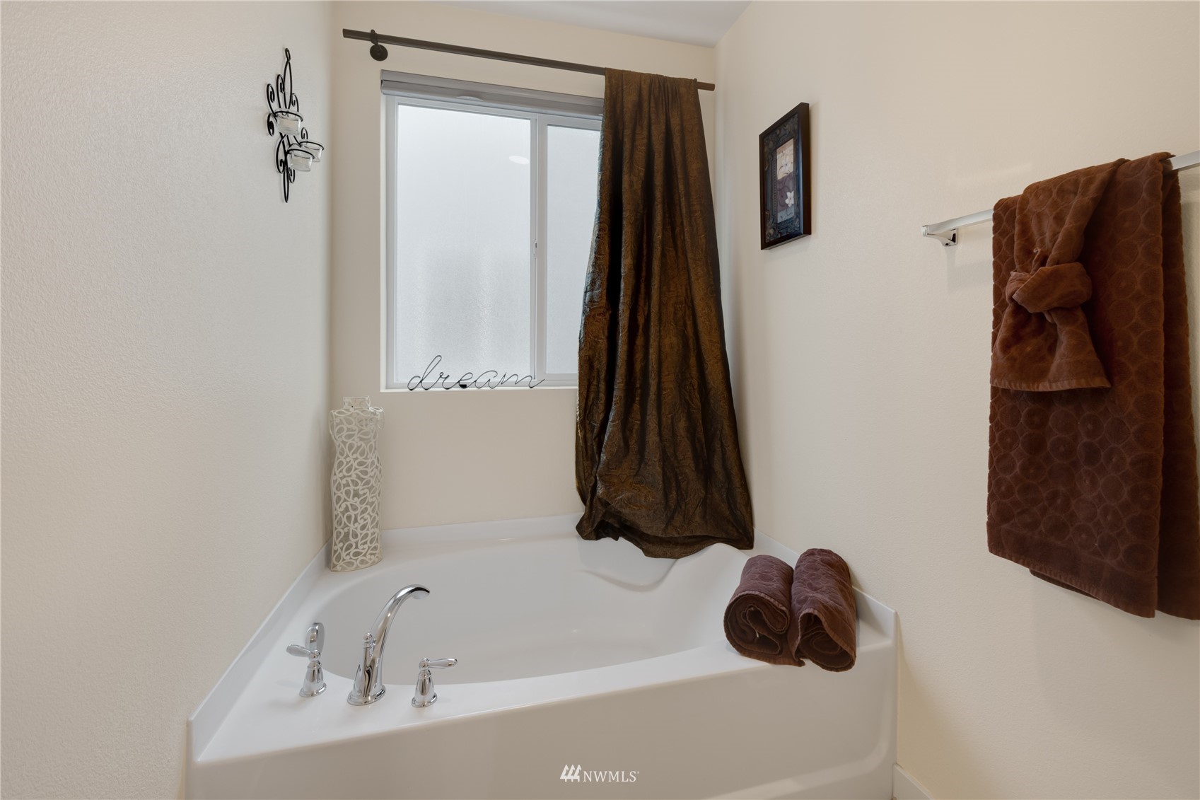 3712 224th Street Southeast Bothell, WA 98021 - Photo 21 of 24 a bathroom with a tub sink and a shower