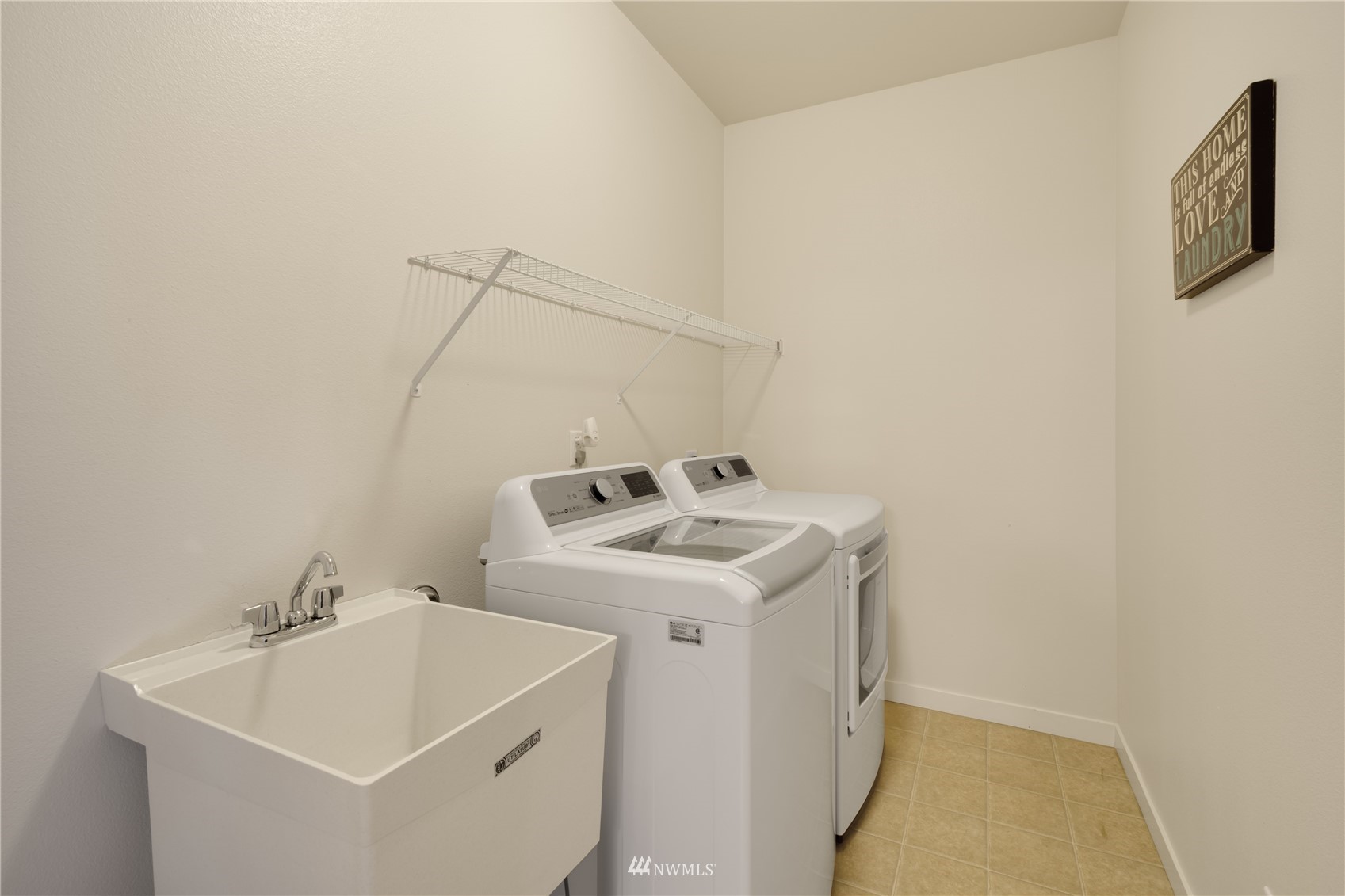 3712 224th Street Southeast Bothell, WA 98021 - Photo 22 of 24 a utility room with dryer and washer