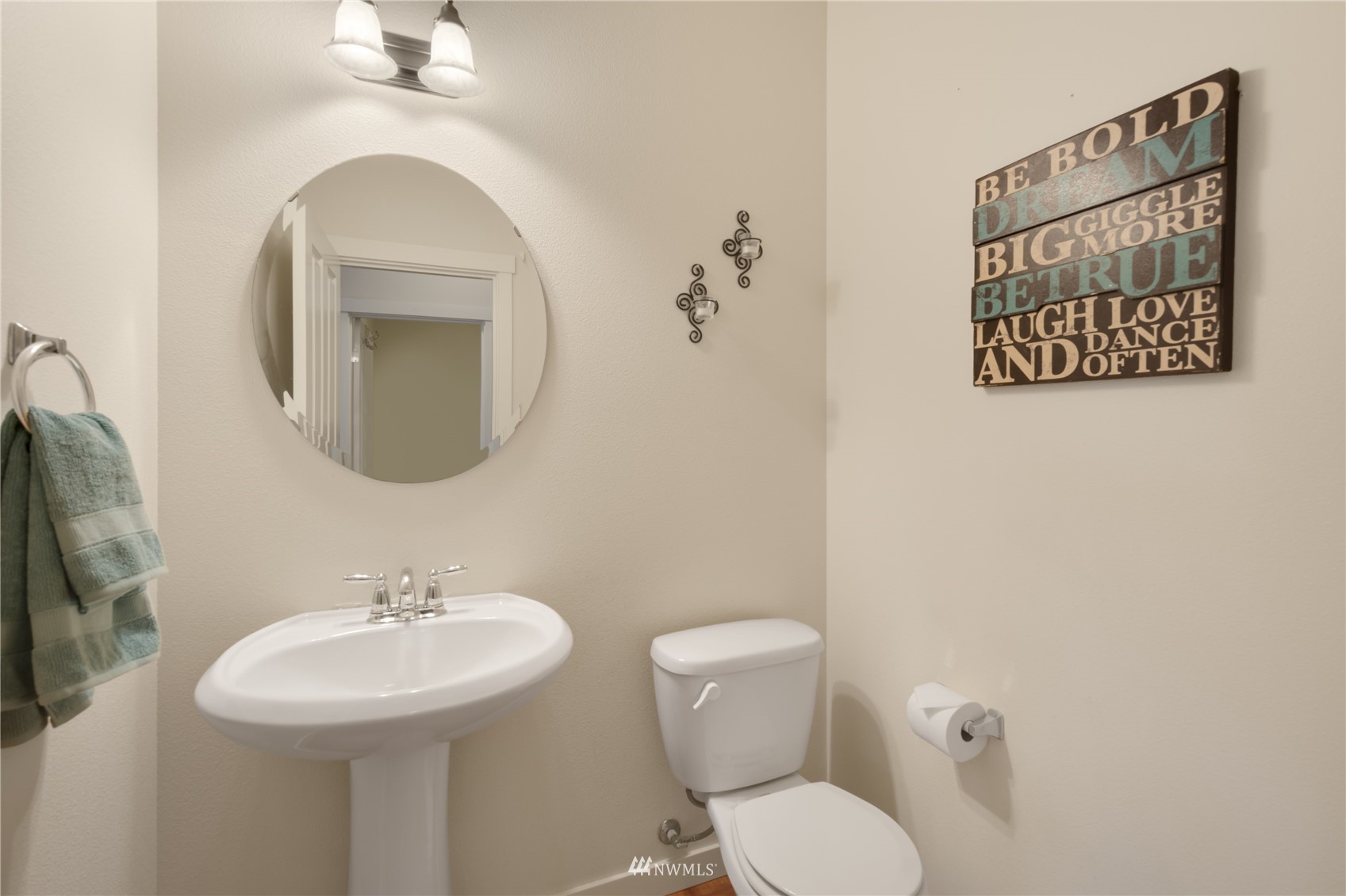 3712 224th Street Southeast Bothell, WA 98021 - Photo 23 of 24 a bathroom with a toilet sink and mirror