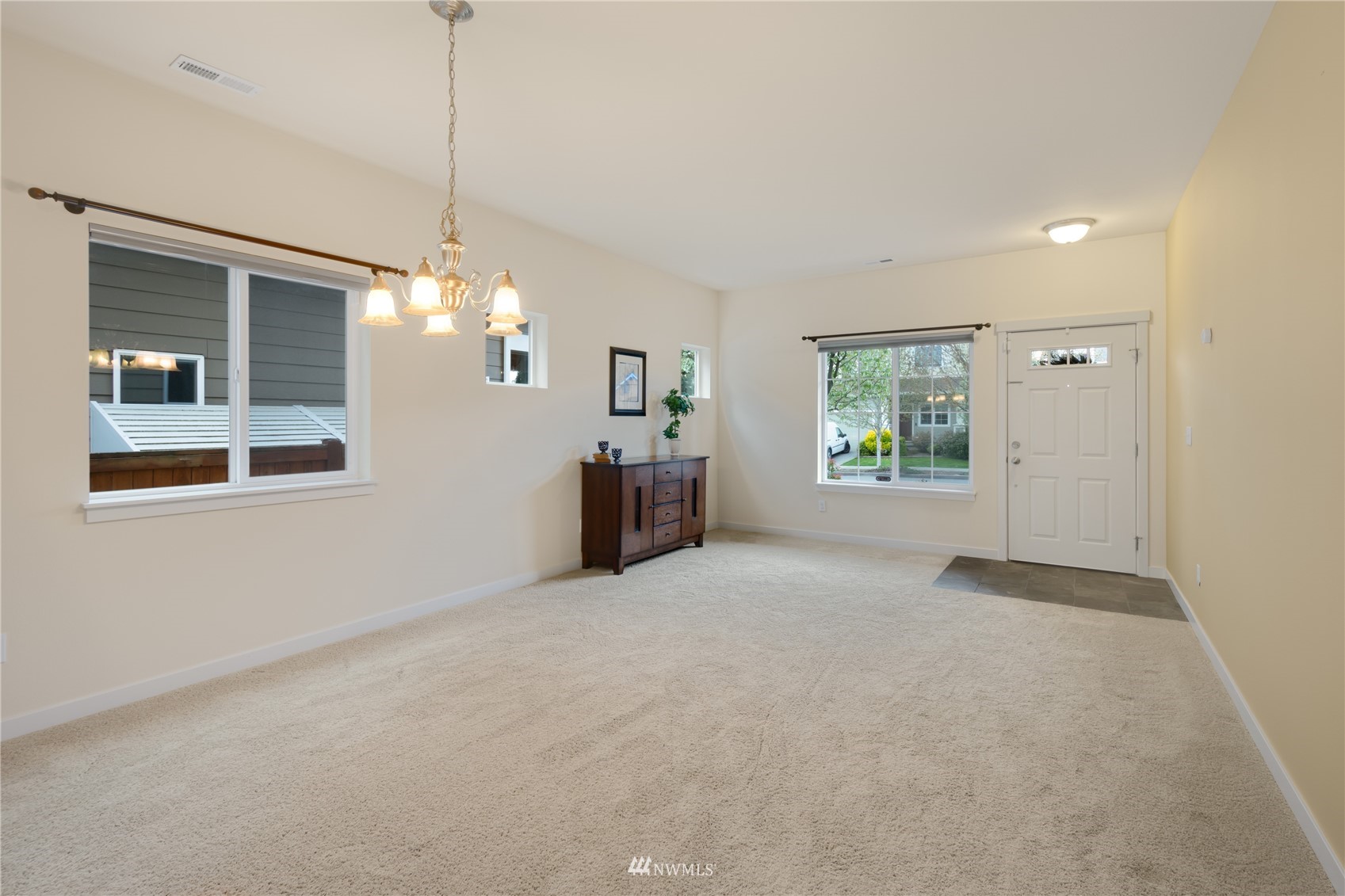 3712 224th Street Southeast Bothell, WA 98021 - Photo 3 of 24 a view of an empty room with a window