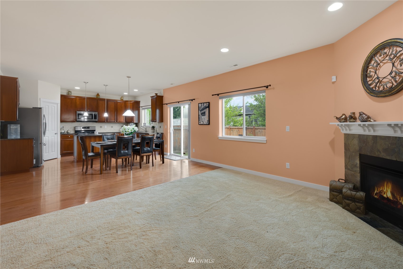 3712 224th Street Southeast Bothell, WA 98021 - Photo 5 of 24 a view of a livingroom with furniture and a kitchen