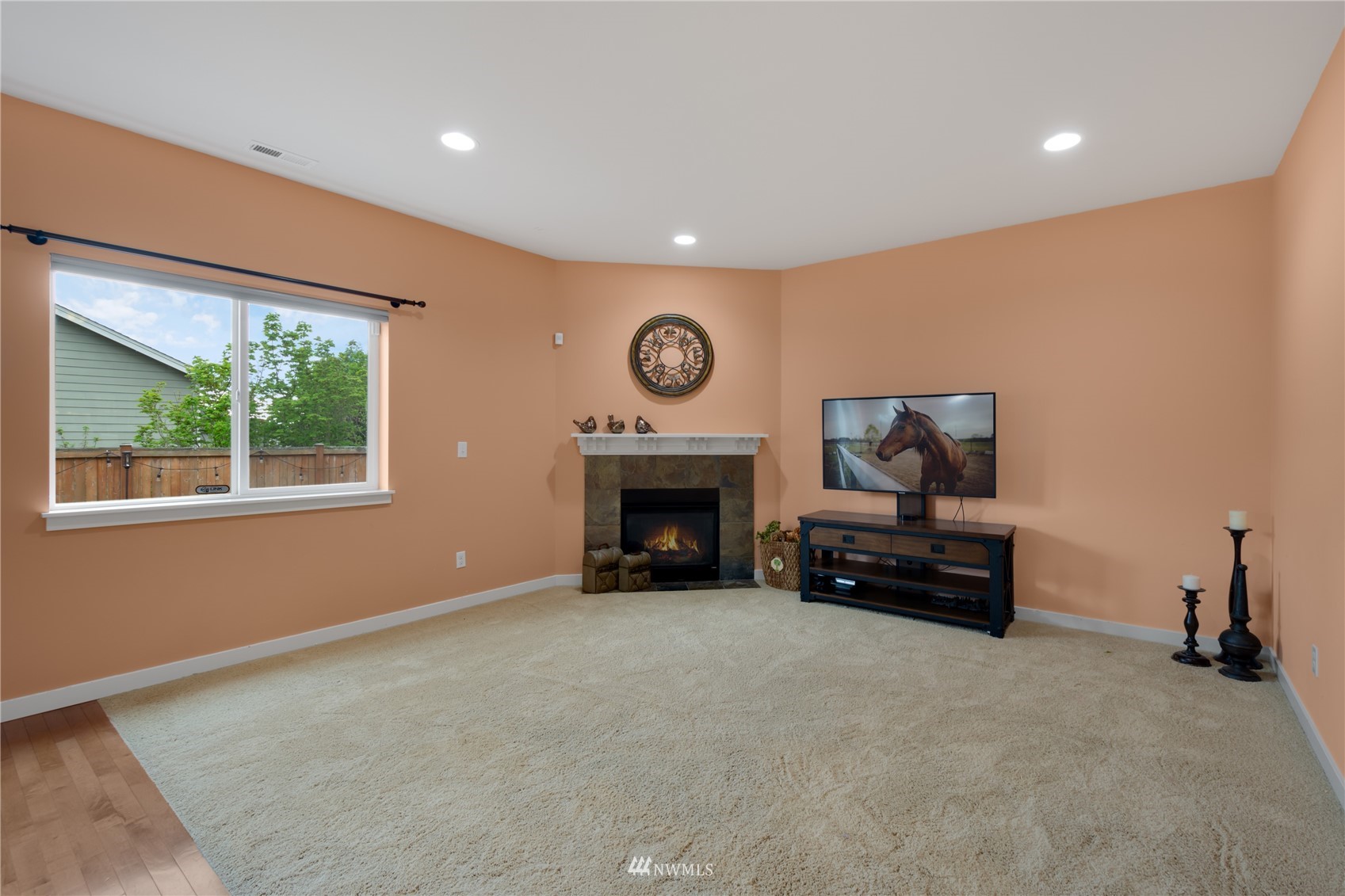 3712 224th Street Southeast Bothell, WA 98021 - Photo 6 of 24 a view of an empty room with a fireplace