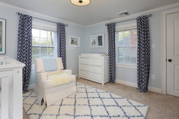 31 Buswell Park Newton, MA 02458 - Photo 12 of 20 a view of a livingroom with furniture and a window