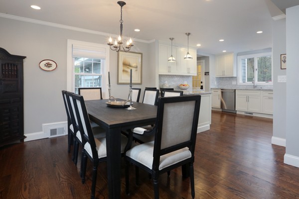 31 Buswell Park Newton, MA 02458 - Photo 14 of 20 a dining room with furniture a chandelier and wooden floor