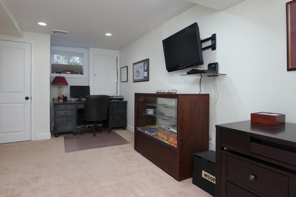 31 Buswell Park Newton, MA 02458 - Photo 17 of 20 a living room with furniture and a flat screen tv