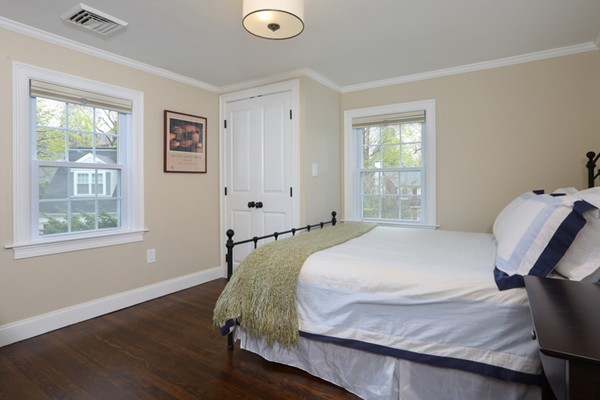 31 Buswell Park Newton, MA 02458 - Photo 10 of 20 a bedroom with a bed and wooden floor