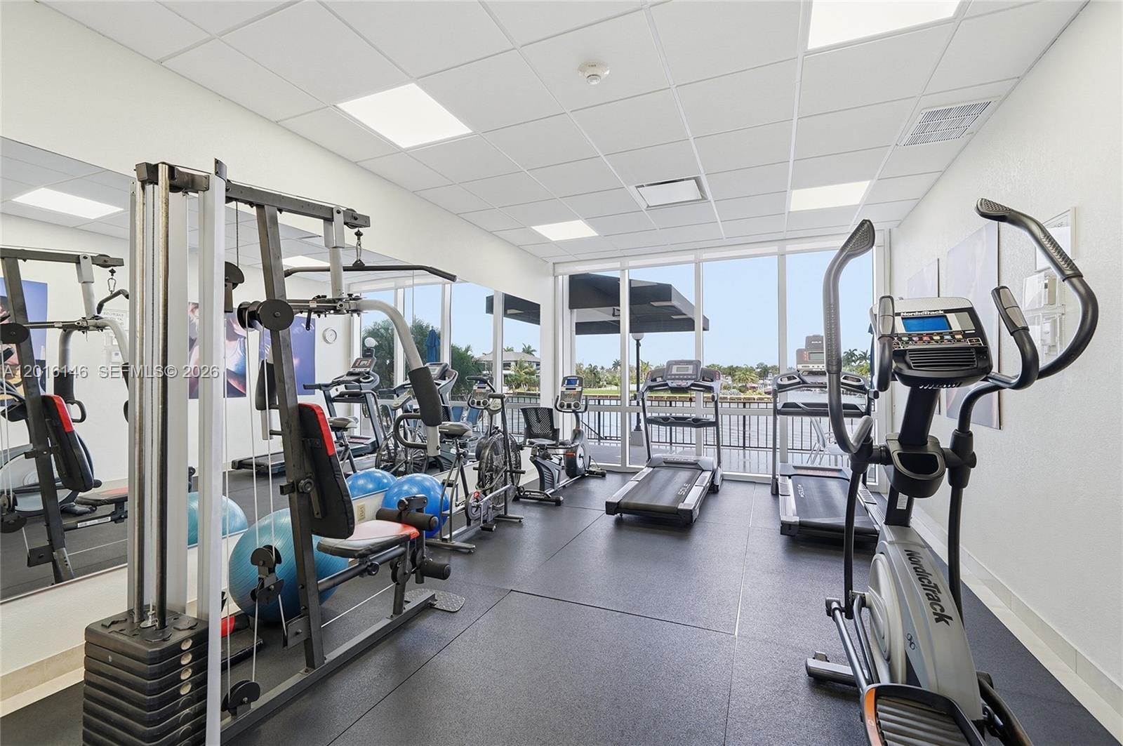 521 North Riverside Drive, Unit 606 Pompano Beach, FL 33062 - Photo 29 of 50 a view of a room with gym equipment