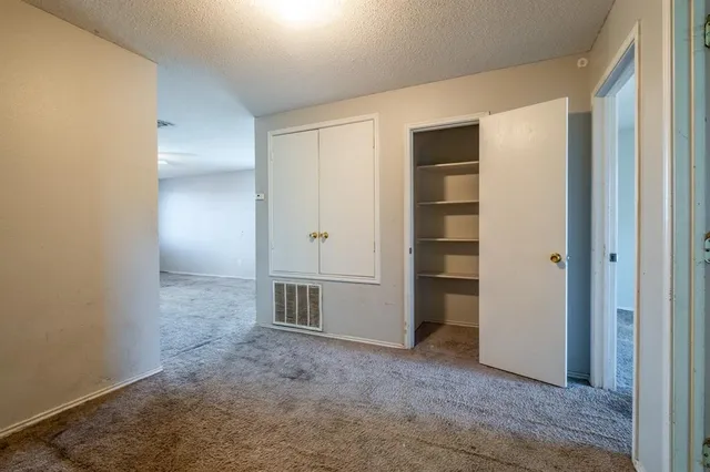 a view of a room with an empty space