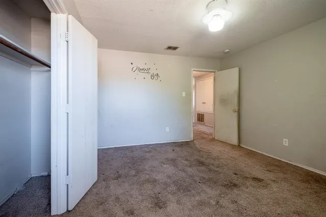 an empty room with a door