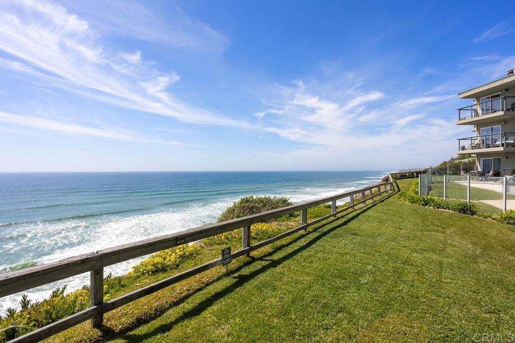 a view of swimming pool with a yard
