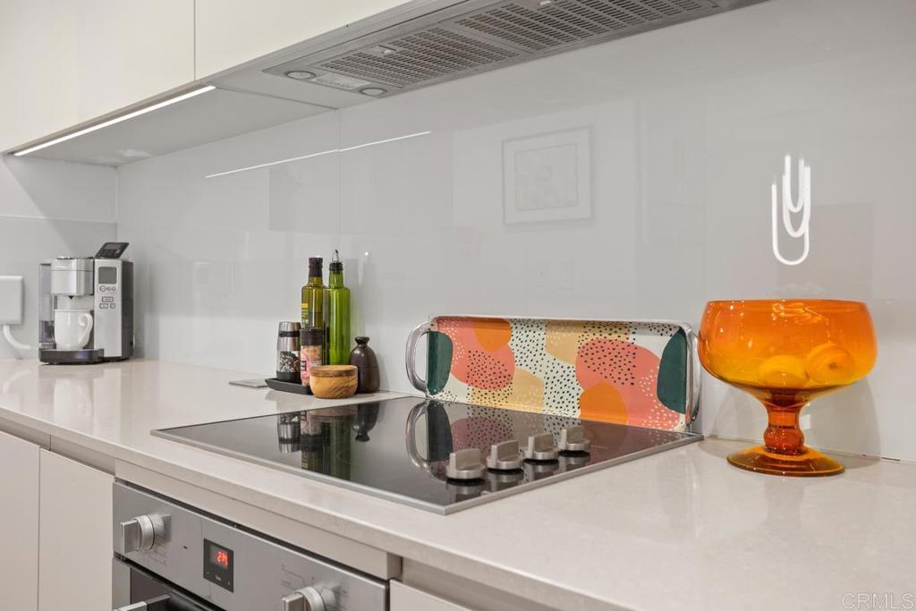 940 Sealane Drive, Unit 3 Encinitas, CA 92024 - Photo 13 of 29 a bathroom with a sink and a mirror