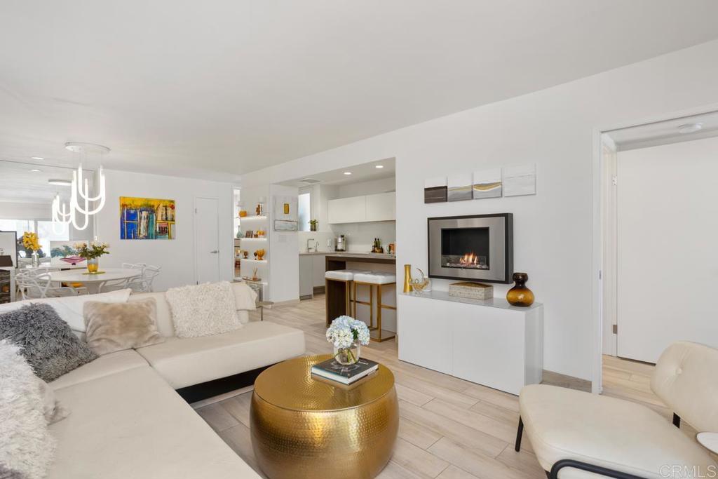940 Sealane Drive, Unit 3 Encinitas, CA 92024 - Photo 16 of 29 a living room with furniture and a fireplace