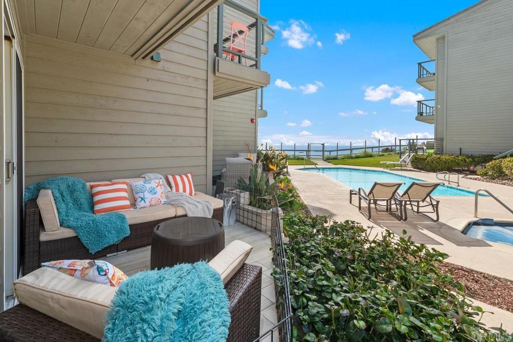 940 Sealane Drive, Unit 3 Encinitas, CA 92024 - Photo 17 of 29 a view of a chairs and table in the terrace