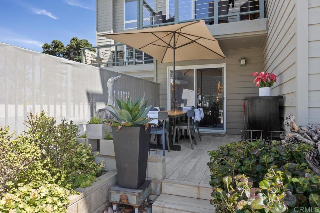 940 Sealane Drive, Unit 3 Encinitas, CA 92024 - Photo 5 of 29 a front view of a house with a patio