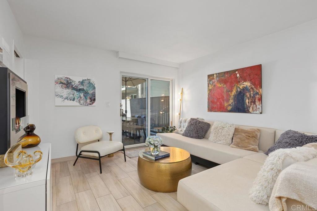 940 Sealane Drive, Unit 3 Encinitas, CA 92024 - Photo 7 of 29 a living room with furniture and wooden floor